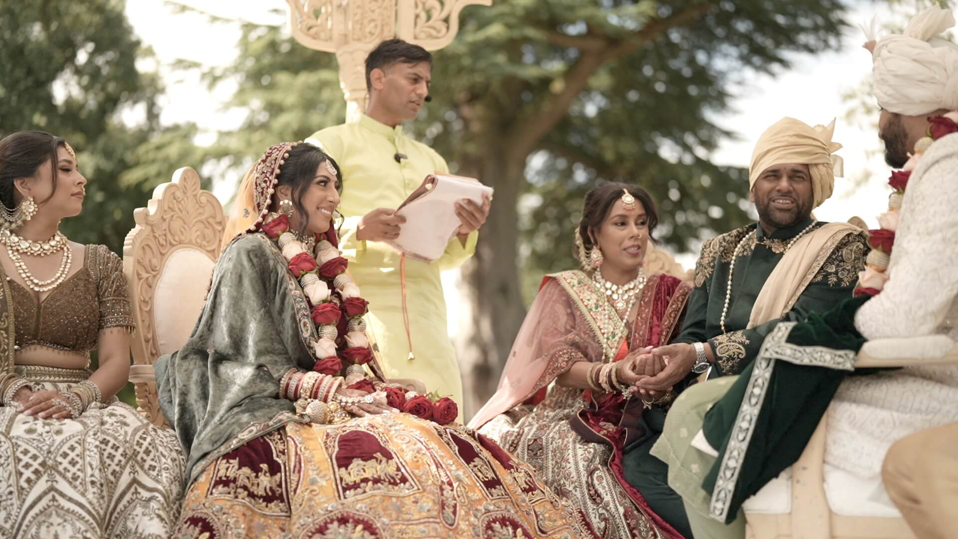 Traditional Indian wedding ceremony with bride, groom, and family members.